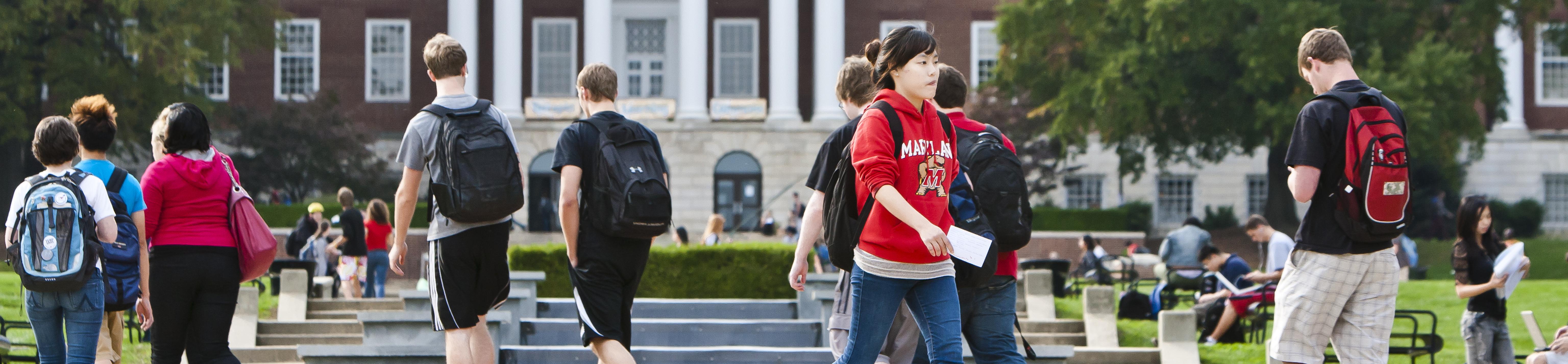 Students walking in front of the fountain in McKeldin Mall