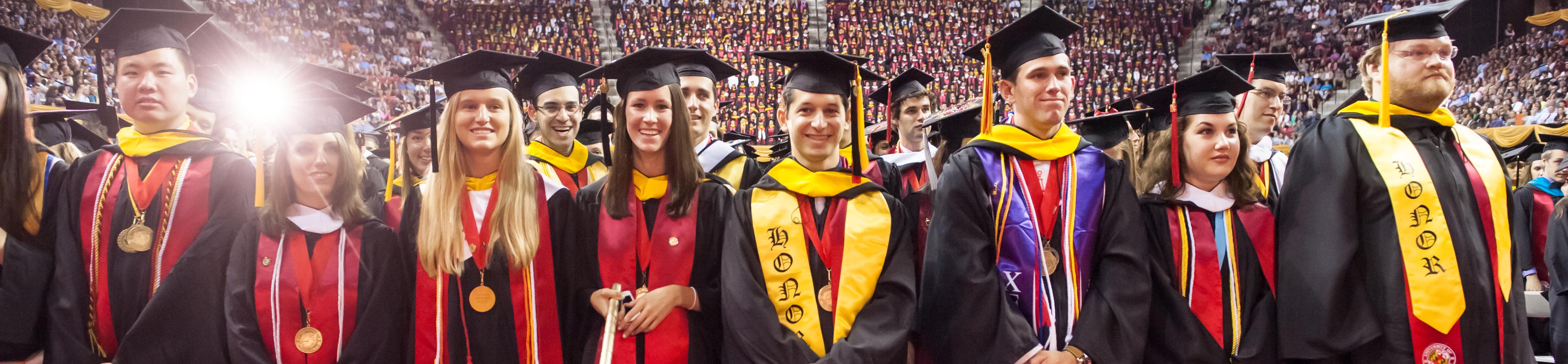 Students in their cap and gowns during graduation